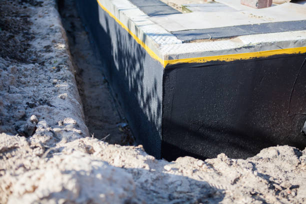 Professional Waterproofing technician working in Winchester, TN